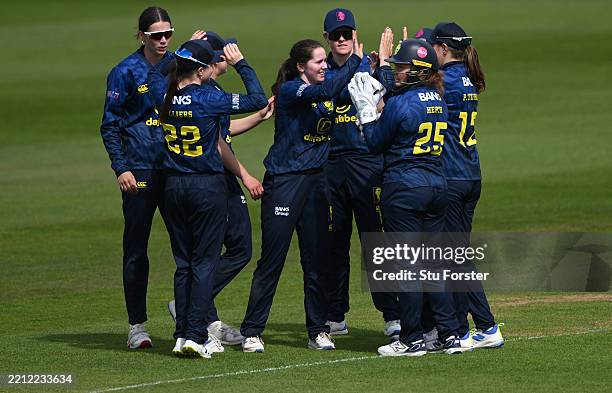 Durham bowler Katherine Fraser is congratulated by team mates after catching Amy Jones off her own bowling during the Metro Bank One Day Cup match...