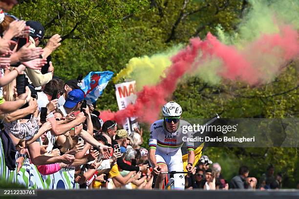 Tadej Pogacar of Slovenia and UAE Team Emirates attacks climbing the Côte de la Redoute while fans cheer during the 111st Liege - Bastogne - Liege...