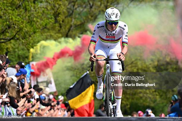Tadej Pogacar of Slovenia and UAE Team Emirates attacks climbing the Côte de la Redoute while fans cheer during the 111st Liege - Bastogne - Liege...