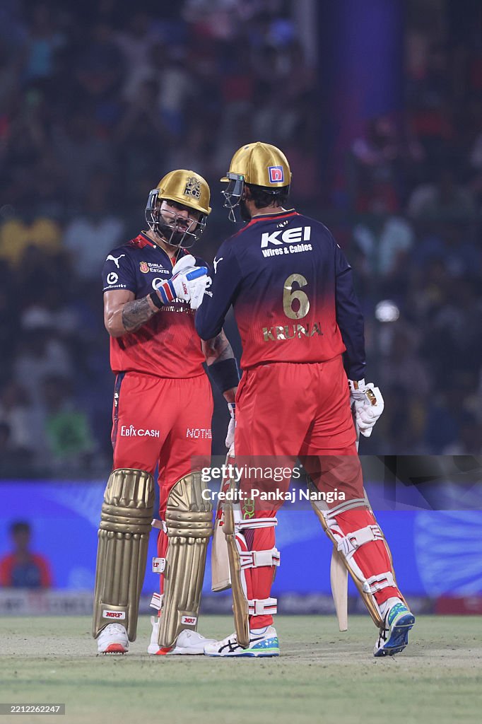 Krunal Pandya and Virat Kohli of Royal Challengers Bengaluru interact ...