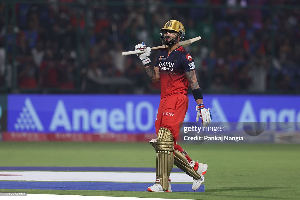 Virat Kohli of Royal Challengers Bengaluru makes their way off after ...