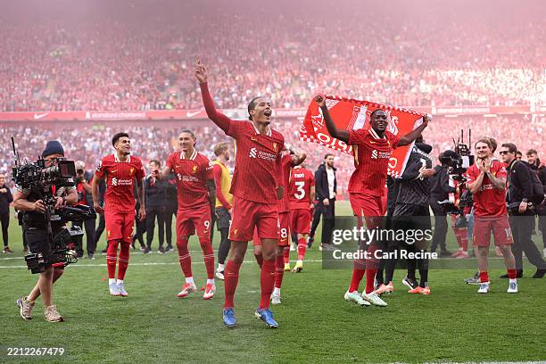 Virgil van Dijk of Liverpool leads the celebrates with his teammates, after confirmation of winning the Premier League title in the Premier League...
