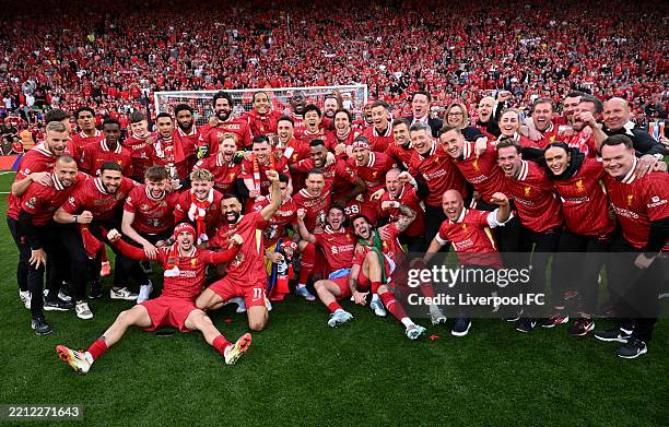 Players of Liverpool pose for a photo as they celebrate the teams victory and confirmation of winning the Premier League title after the Premier...
