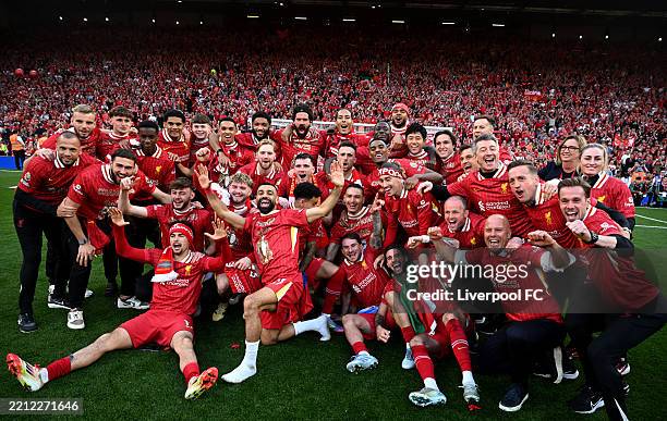 Players of Liverpool pose for a photo as they celebrate the teams victory and confirmation of winning the Premier League title after the Premier...