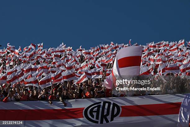 Fans of River Plate cheer prior to the Torneo Apertura Betano 2025 match between River Plate and Boca Juniors at Estadio Mas Monumental Antonio...