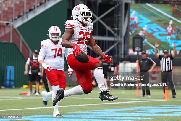 Deon Jackson of DC Defenders celebrates after scoring a touchdown during the fourth quarter against the Arlington Renegades at Choctaw Stadium on...