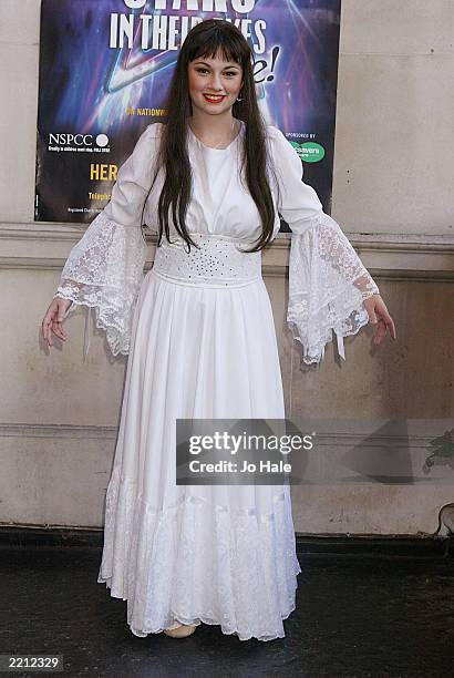 Kate Bush played by Jaclyn Bell attends the Stars In Their Eyes Live charity gala performance at Her Majesty's Theatre July 27, 2003 in London.