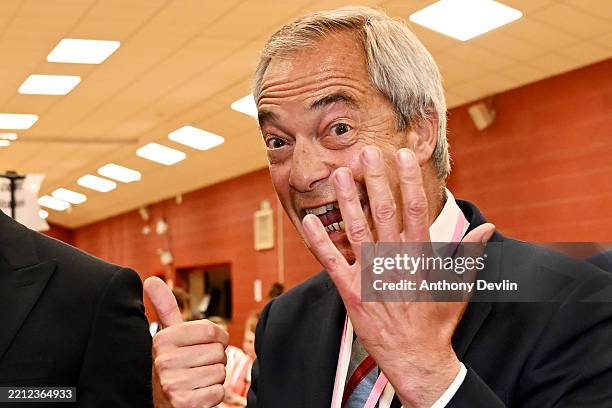 Nigel Farage of the Reform Party celebrates as Reform Party candidate Sarah Pochin is declared the winner of the Runcorn and Helsby by-election at...
