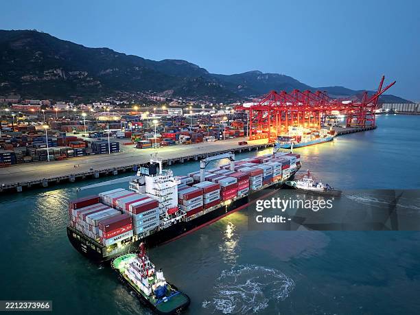 Container ship arrives at Lianyungang port in Lianyungang, in China's eastern Jiangsu province in the morning on May 2, 2025. China said on May 2 it...