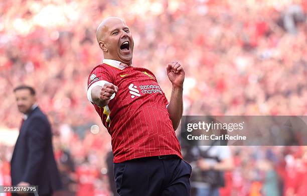 Arne Slot, Manger of Liverpool, celebrates the teams victory and confirmation of winning the Premier League title after the Premier League match...