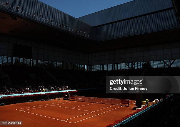 The empty center court is seen during a general power blackout during Day Seven of the Mutua Madrid Open at La Caja Magica on April 28, 2025 in...
