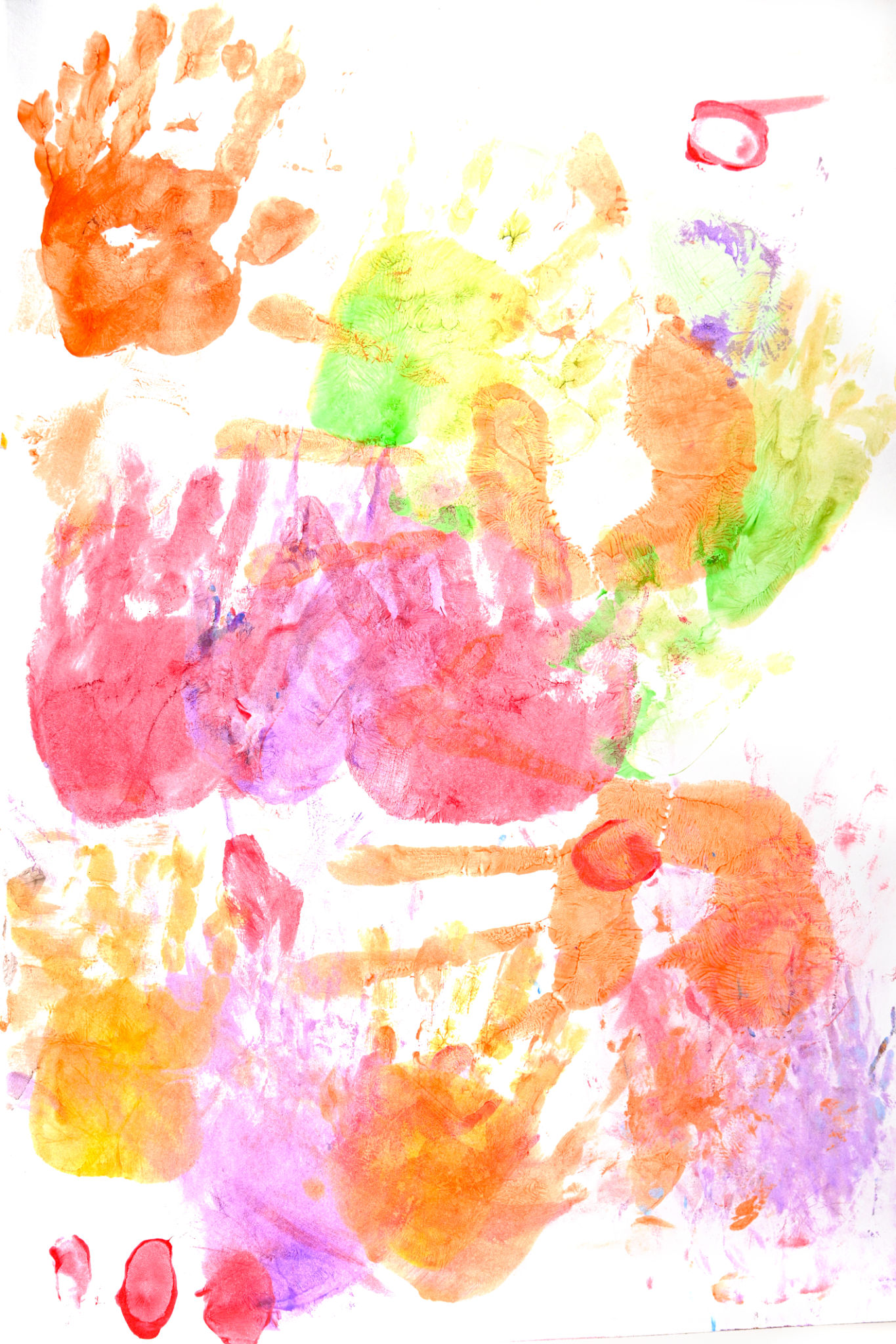 Colorful children's hand prints on a white background. Colorful children's hand prints on a white background.