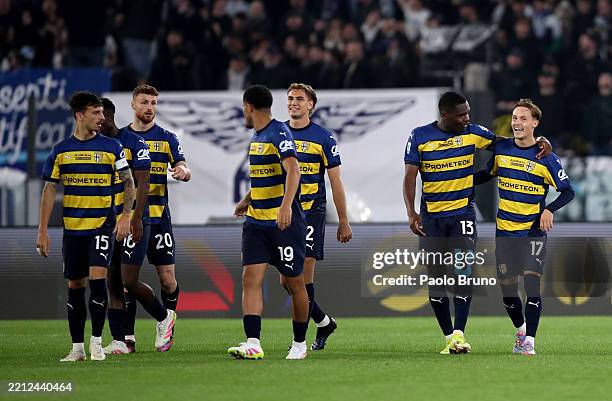 Jacob Ondrejka of Parma Calcio celebrates with teammate Ange-Yoan Bonny after scoring his team's first goal during the Serie A match between SS Lazio...