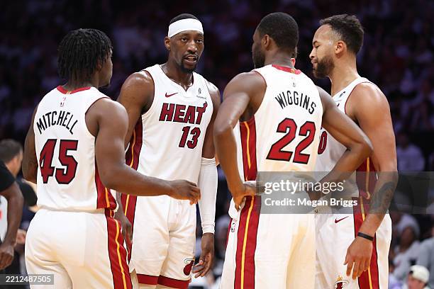 Bam Adebayo of the Miami Heat huddles with teammates during the first quarter against the Cleveland Cavaliers in Game Four of the Eastern Conference...