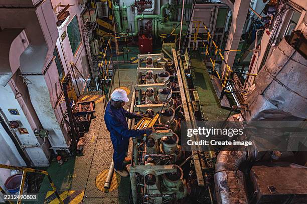 Ship First Engineer 76 Crew Working In Engine Room On A Ship Stock Photos, High-Res ...