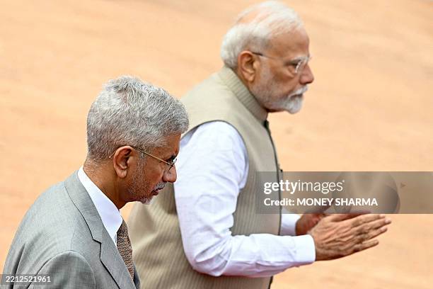 India's Prime Minister Narendra Modi and Foreign Minister Subrahmanyam Jaishankar attend the ceremonial reception of Angola's President Joao Lourenco...