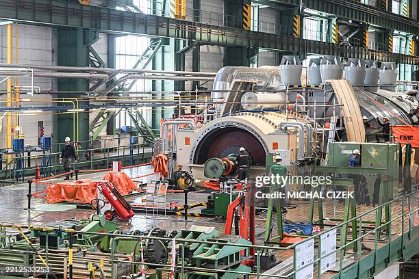 Staff members of the Dukovany nuclear power plant control a turbine during a maintenance shutdown of the unit 3 of the nuclear power plant in...