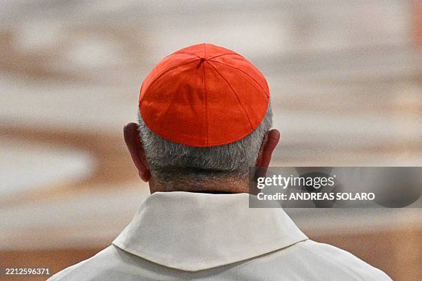 This photograph shows a cardinal with a red zucchetto as skullcap during the Eight Novemdiale mass, following the funeral of the pope and ahead of...