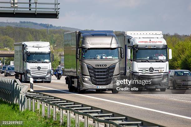 german highway a5 and trucks - autobahn stock pictures, royalty-free photos & images