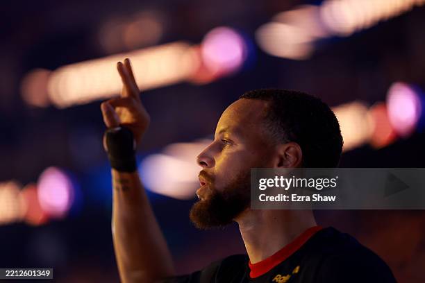 Stephen Curry of the Golden State Warriors walks onto the court for player introductions before their game against the Houston Rockets in Game Four...
