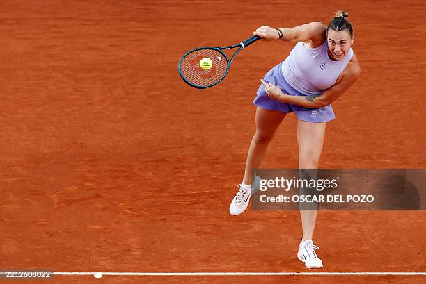 Belarus' Aryna Sabalenka serves the ball to US' Coco Gauff during their 2025 WTA Tour Madrid Open tennis tournament singles final match at the Caja...