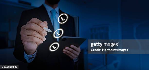 businessman marking all his task as done. business done. - checklist stockfoto's en -beelden