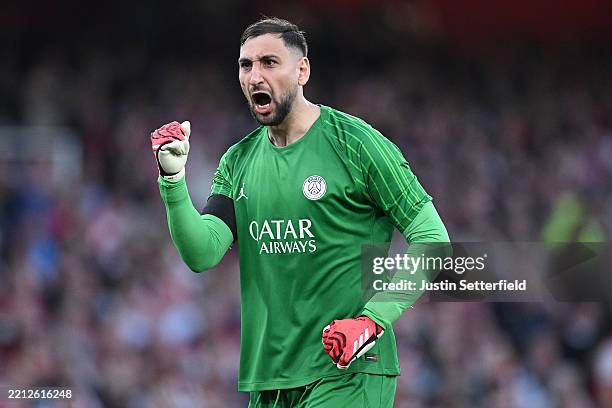 Gianluigi Donnarumma of Paris Saint-Germain celebrates after teammate Ousmane Dembele scores his team's first goal during the UEFA Champions League...