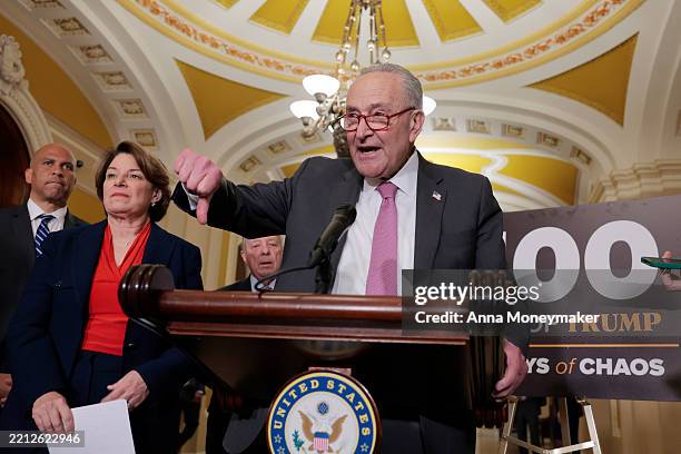 Senate Minority Leader Chuck Schumer speaks to reporters alongside Sen. Cory Booker and Sen. Amy Klobuchar following the weekly Senate Democrat...