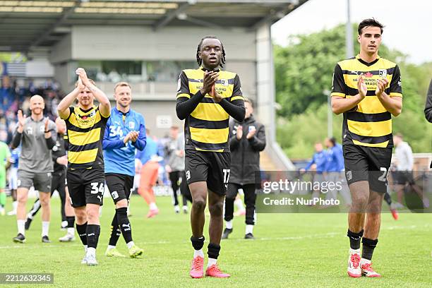 Players applaud fans after the final whistle during the Sky Bet League 2 match between Colchester United and Barrow at the Weston Homes Community...