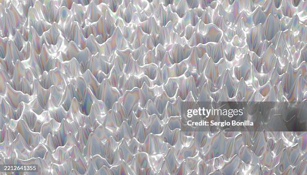 abstract metallic surface with iridescent waves and light reflections. blender 3d illustration - screen saver stock illustrations