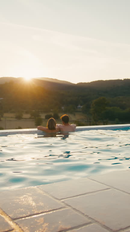 142 Romantic Young Couple Embracing In Swimming Pool Stock Videos ...