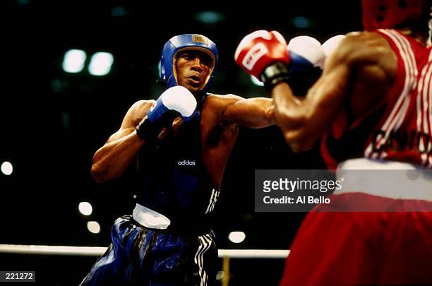 Felix Savon of Cuba in action during his bout versus David Defiagbon of Canada in their 91kg final at the Alexander Memorial at the 1996 Centennial...