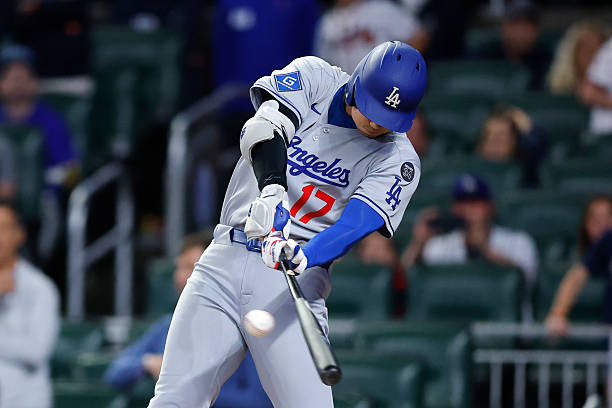 Shohei Ohtani of the Los Angeles Dodgers hits a single during the first inning against the Atlanta Braves at Truist Park on May 3, 2025 in Atlanta,...