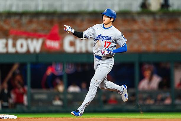 Shohei Ohtani of the Los Angeles Dodgers hits a home run in the third inning against the Atlanta Braves at Truist Park on May 3, 2025 in Atlanta,...