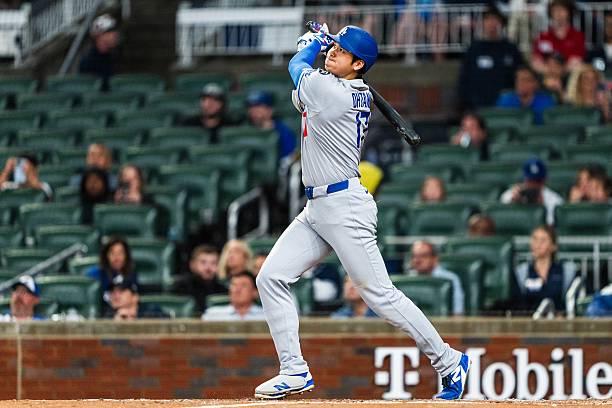 Shohei Ohtani of the Los Angeles Dodgers hits a home run in the third inning against the Atlanta Braves at Truist Park on May 3, 2025 in Atlanta,...