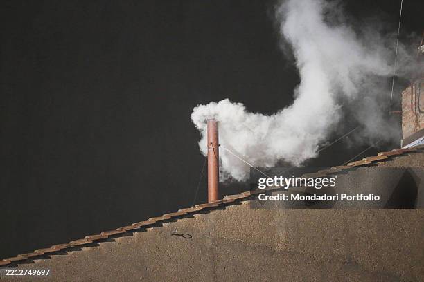 White smoke from the roof of the Sistine Chapel indicating the election of Cardinal Jorge Mario Bergoglio as Roman Pontiff with the name of Pope...