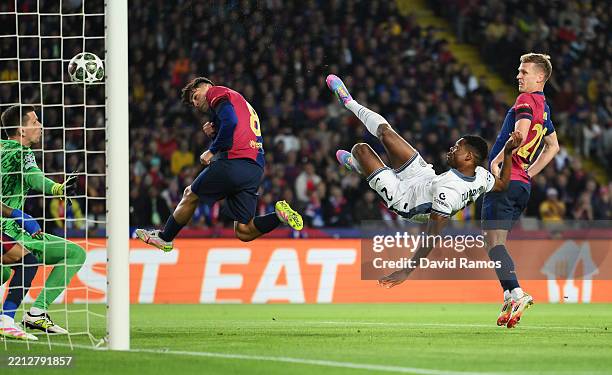 Denzel Dumfries of FC Internazionale scores his team's second goal whilst under pressure from Pedri and Frenkie de Jong of FC Barcelona during the...