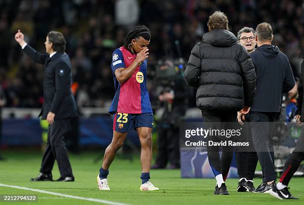 Jules Kounde of FC Barcelona leaves the pitch as he is substituted off after sustaining an injury during the UEFA Champions League 2024/25 Semi Final...