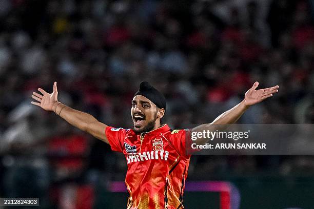 Punjab Kings' Arshdeep Singh celebrates after taking the wicket of Lucknow Super Giants' Nicholas Pooran during the Indian Premier League Twenty20...