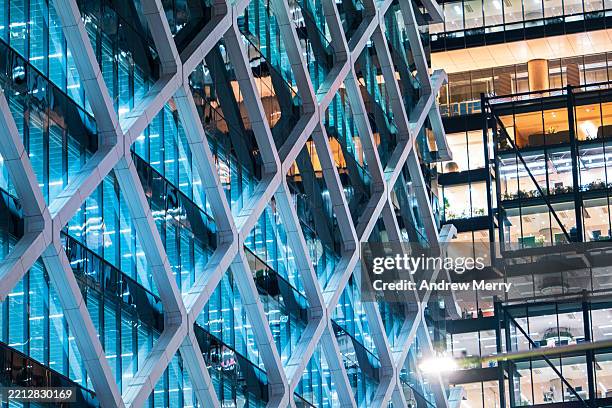 office buildings in financial district at night - smart city stock pictures, royalty-free photos & images