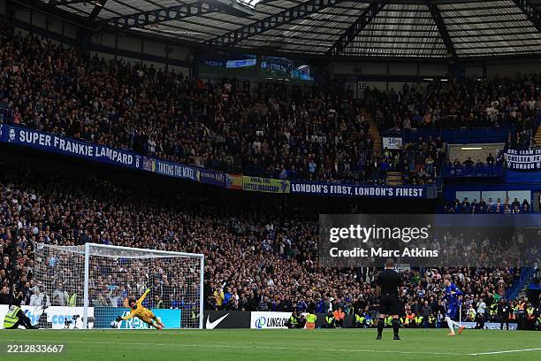 Cole Palmer of Chelsea scores the third goal with a penalty during the Premier League match between Chelsea FC and Liverpool FC at Stamford Bridge on...