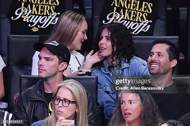 Lily-Rose Depp and 070 Shake attend a basketball game between the Los Angeles Lakers and the Minnesota Timberwolves at Crypto.com Arena on April 30,...