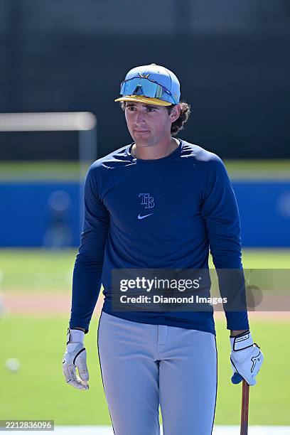 Cooper Kinney of the Tampa Bay Rays takes batting practice prior to a spring training game against the Toronto Blue Jays at TD Ballpark on March 20,...
