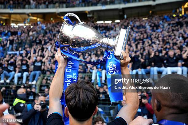 Club Brugge KV player lifts the Croky Cup Trophy after Club Brugge KV defeated RSC Anderlecht 2-1 in the Croky Cup Final at King Baudouin Stadium on...