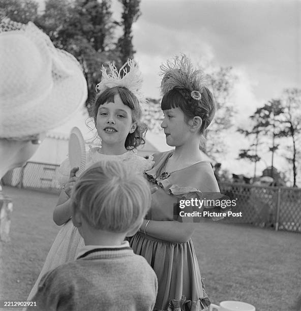 Children attend the 'Theatrical Garden Party' held at the Roehampton Club, UK, 31st May 1949. Original publication: Picture Post - 4816 - Matinee at...