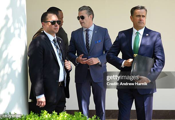 Secretary of Defense Pete Hegseth and CIA Director John Ratcliffe arrive for a National Day of Prayer event hosted by President Donald Trump in the...