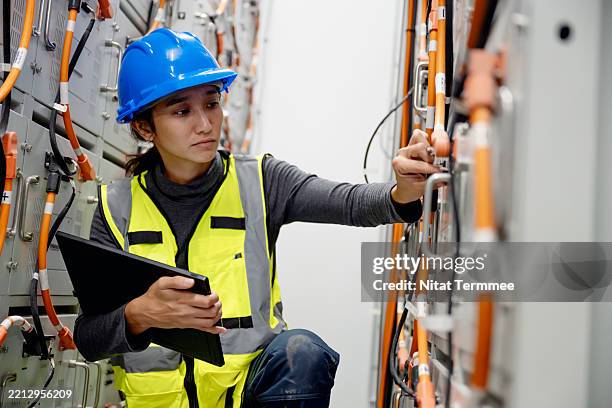 energy storage systems enhance grid reliability by providing backup power during blackouts or grid failures, facilitated by their energy storage management systems. - microgrid stock pictures, royalty-free photos & images