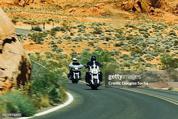 outlaw motorcycle club on a rural road - motorized vehicle riding stock pictures, royalty-free photos & images