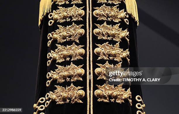 Fashion piece is displayed during the press preview of The Costume Institute's exhibition "Superfine: Tailoring Black Style" at The Metropolitan...
