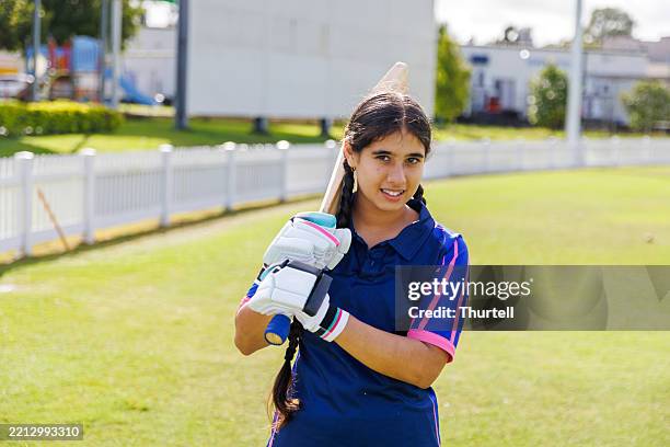 portrait of indian junior female cricket player - indian cricket player stock pictures, royalty-free photos & images